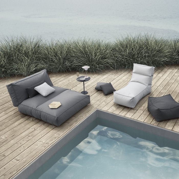 stay outdoor patio lounger stone cloud in a pool with outdoor furniture lifestyle