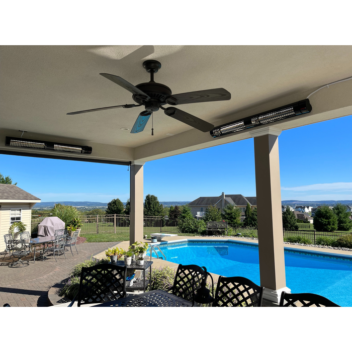 Dual RADtec heaters installed under a pergola roof over a poolside patio area.