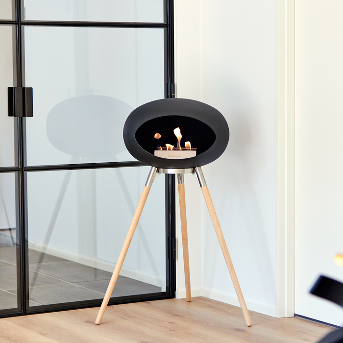 Le Feu Black Dome Bioethanol Fireplace ground high polished steel, soaptreated legs and steel burner indoor lifestyle