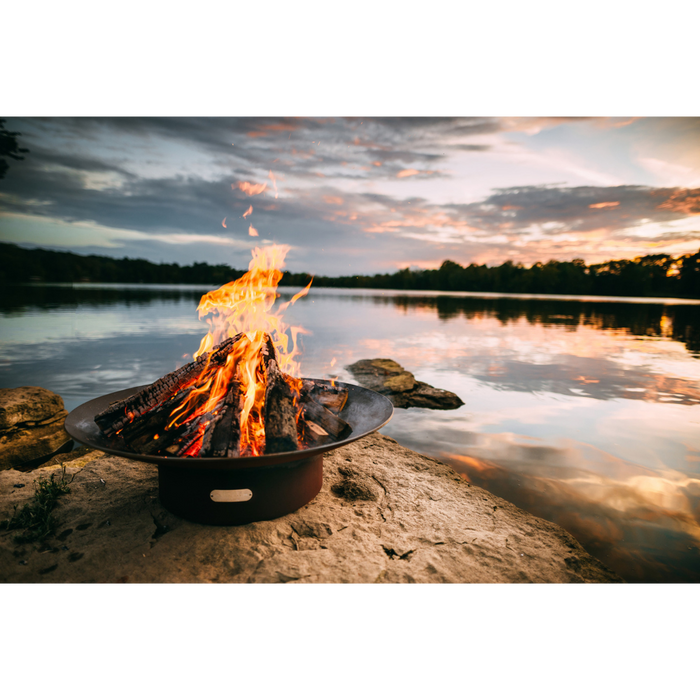 Fire pit art outdoor Asia 60" fire pit stainless steel with wood in a lake lifestyle