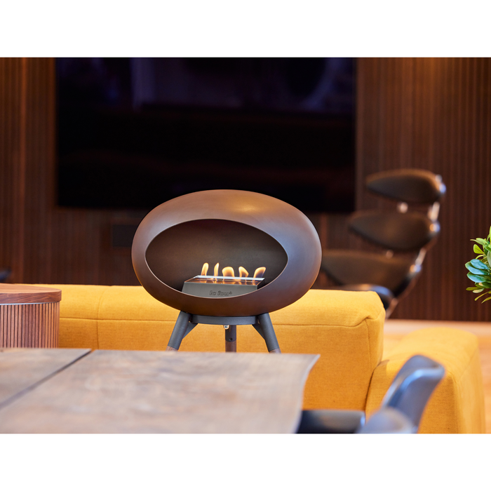 Le Feu Mocca Dome Bioethanol Fireplace ground high black bowl, smoked legs and steel burner indoor with indoor furniture lifestyle