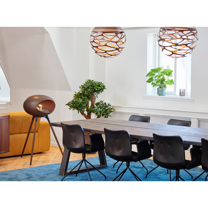 Le Feu Mocca Dome Bioethanol Fireplace ground high black bowl, smoked legs and steel burner indoor with dining table and chairs lifestyle