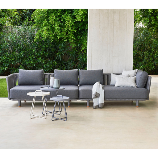 lifestyle image of cane-line moments lounge 2 Grey, String Open Cane-line Soft Rope Incl. Grey Cane-line AirTouch in a patio with outdoor furniture