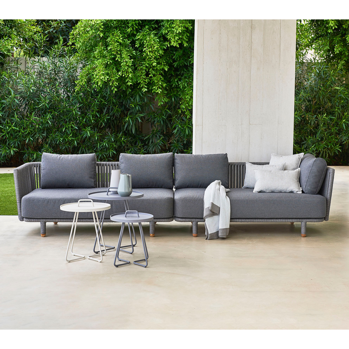lifestyle image of cane-line moments lounge 2 Grey, String Open Cane-line Soft Rope Incl. Grey Cane-line AirTouch in a patio with outdoor furniture