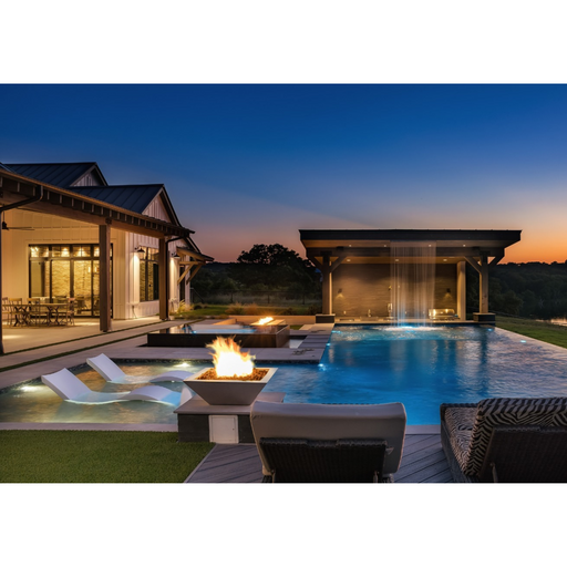 24" Maya Fire Bowl-GFRC CONCRETE vanilla on a pool with oudoor furniture lifestyle