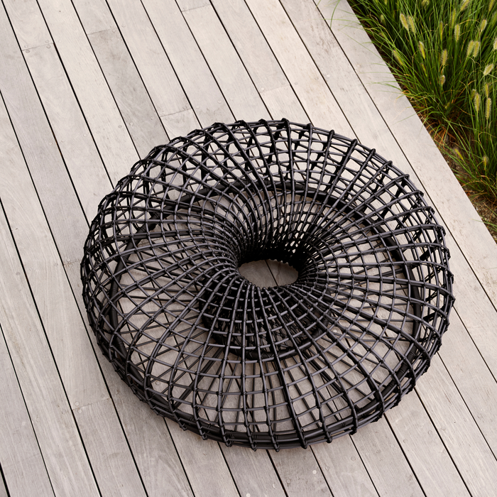 Cane line Nest coffee table footstool large Aluminium Weave black in a patio lifestyle
