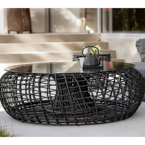 Cane line Nest coffee table footstool large Aluminium Weave black in a patio lifestyle