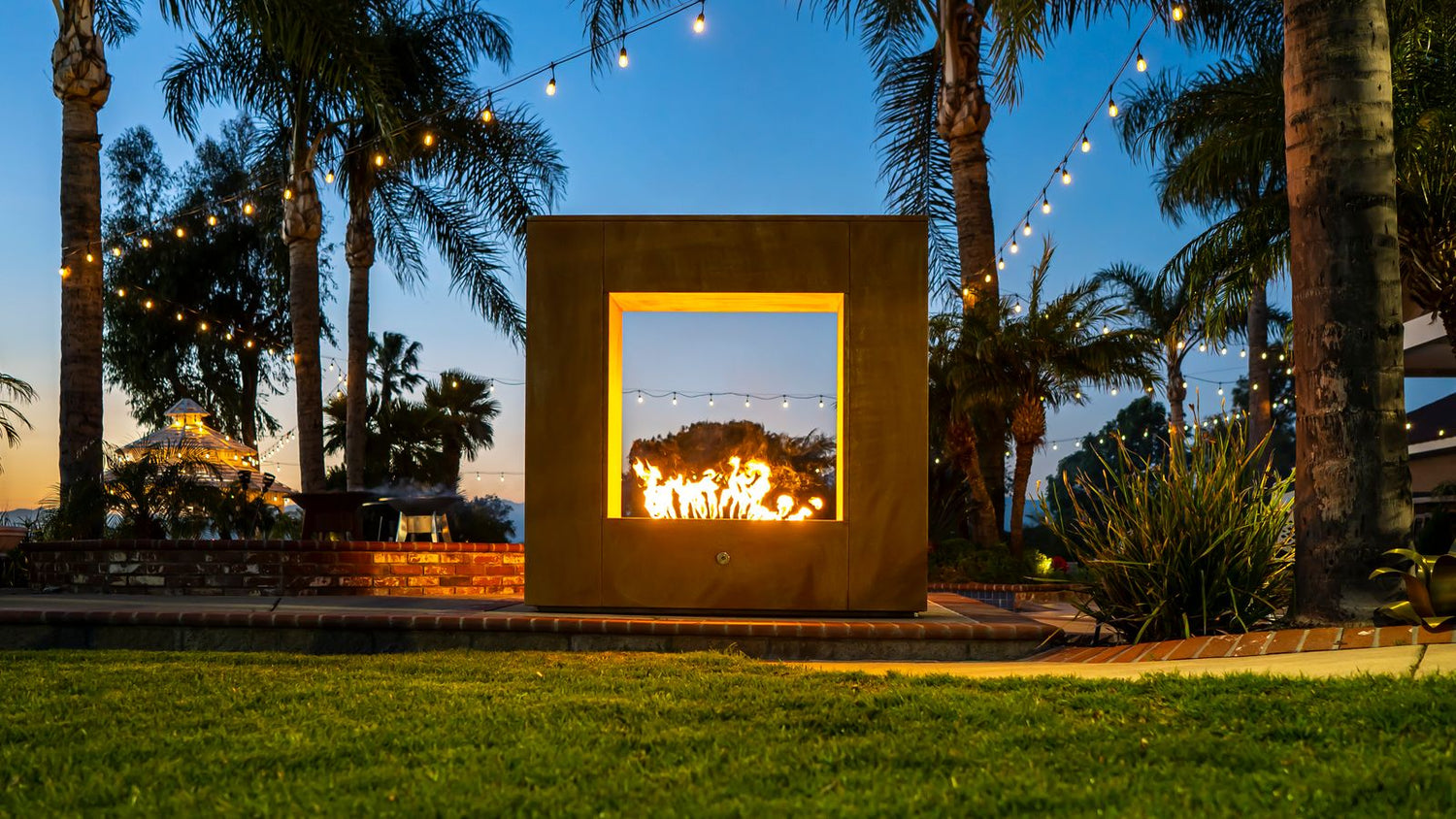 Corten Steel fire place outdoor in a garden lifestyle