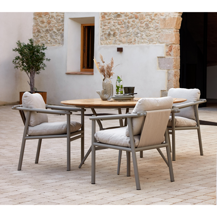 cane line Sticks armchair Taupe aluminium sand cushion lifestyle with round dining table