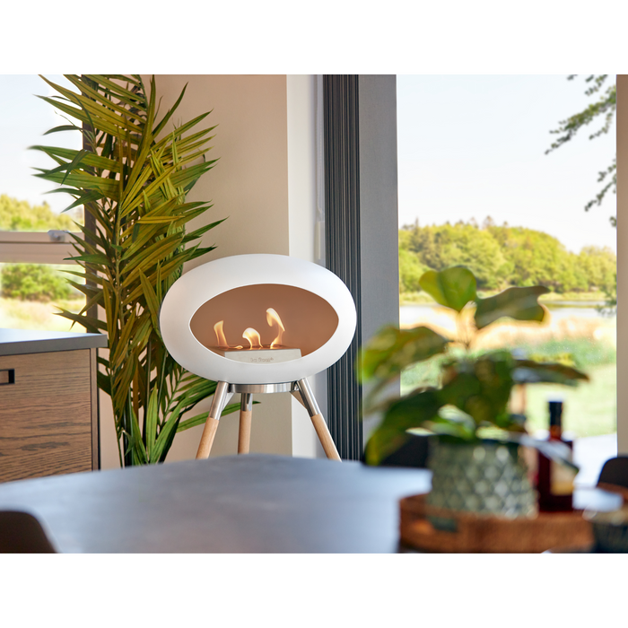 Le Feu White Dome Bioethanol Fireplace ground high polished steel bowl, soaptreated legs and steel burner indoor lifestyle