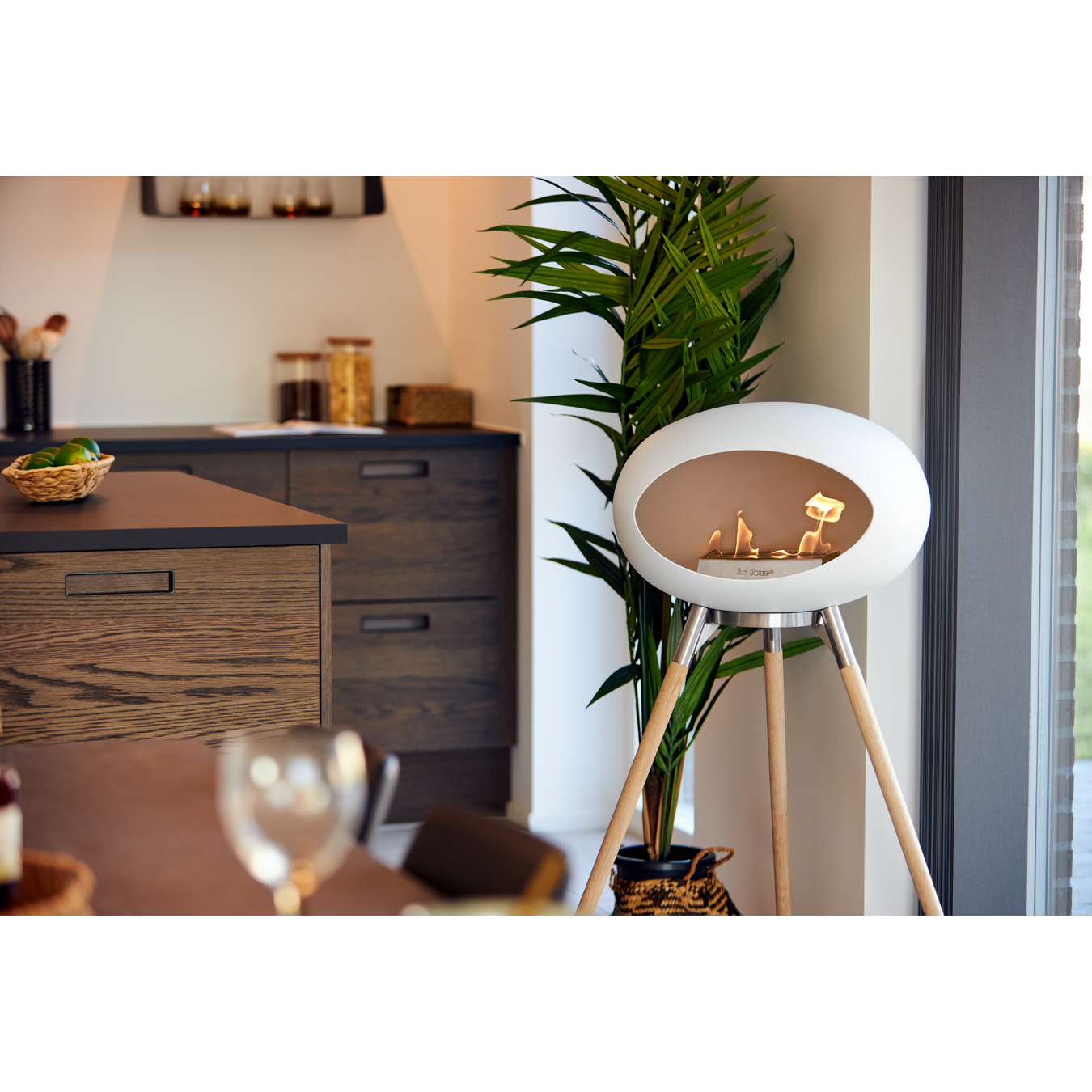 Le Feu White Dome Bioethanol Fireplace ground high polished steel bowl, soaptreated legs and steel burner indoor lifestyle