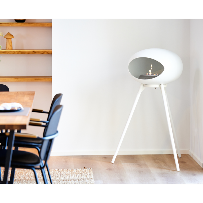 Le Feu White Dome Bioethanol Fireplace ground high white bowl, white legs and steel burner indoor with indoor furniture lifestyle