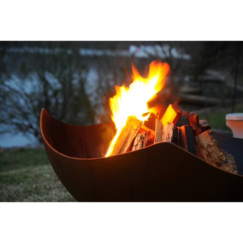 Firepit art outdoor Asia 36" fire pit stainless steel with wood in a patio