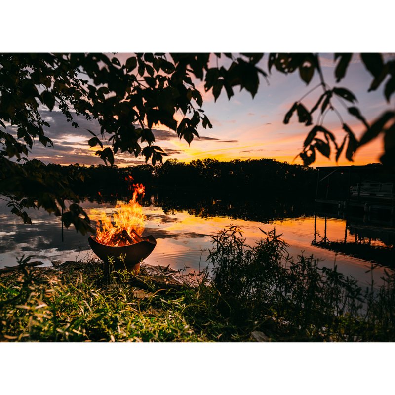 Fire pit art outdoor Manta Ray fire pit stainless steel with wood in a lake lifestyle