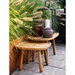 lifestyle image of cane-line royal coffee table in teak square and cane-line royal coffee table in teak rectangular in a patio