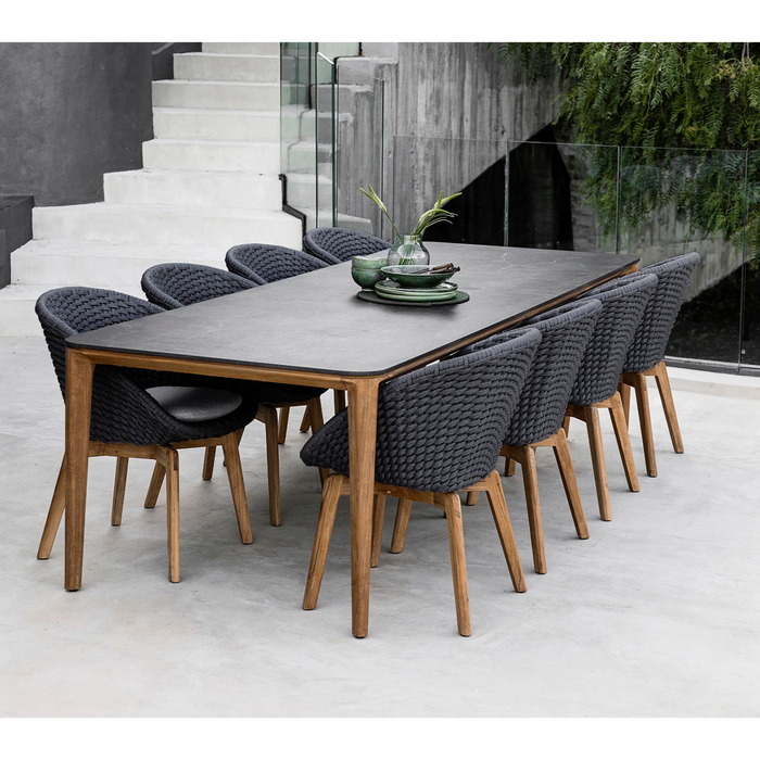 cane line aspect dining  table fossil black lifestyle with dining chairs