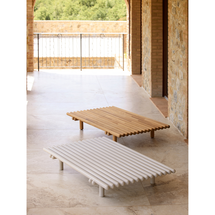 cane-line sticks platform coffee table teak and sand,aluminium coffee tables in a patio lifestyle