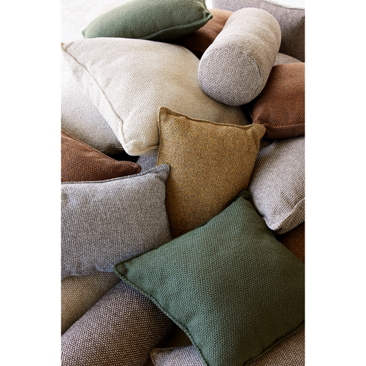 lifestyle image of cane-line rise scatter cushion all colors and sizes