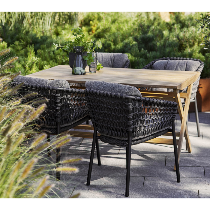 cane-line ocean chair Dark Grey, Open Cane-line Soft Rope chair with Dark Grey, Cane-line Wove cushion in a patio with table lifestyle