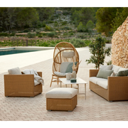 cane line hive chair Natural, small round tube Cane-line Weave with teak base and Sand, Cane-line AirTouch cushion in a patio with outdoor furniture lifestyle