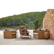 cane line hive chair Natural, small round tube Cane-line Weave with teak base and Turmeric yellow, Cane-line Rise cushion in a patio with outdoor furniture lifestyle