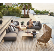 cane line hive chair Natural, small round tube Cane-line Weave with Teak base and Light brown, Cane-line Rise cushion in a patio with outdoor furniture lifestyle