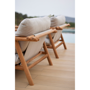 sticks lounge chair Teak Desert sand Cane-line-Rise cushion in a patio lifestyle