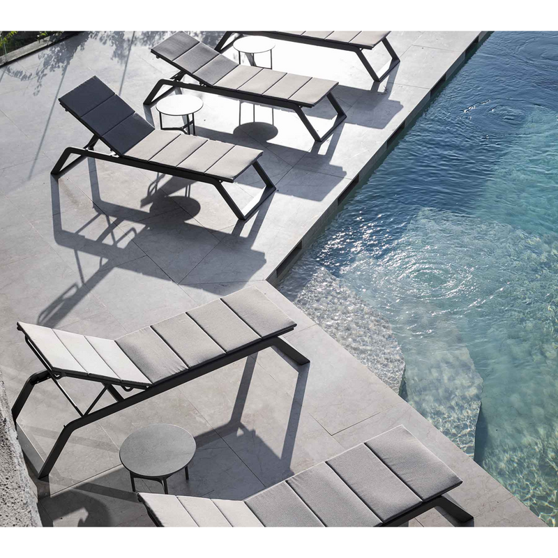 cane-line siesta sunbed Grey, Cane-line Tex sunbed with Light grey, Cane-line Virtue cushion in a pool lifestyle