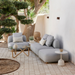 cane-line capture pouf light grey, cane-line airtouch pouf in a patio with outdoor furniture lifestyle