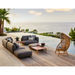 cane-line capture pouf taupe, cane-line airtouch pouf in a patio with pool and outdoor furniture lifestyle