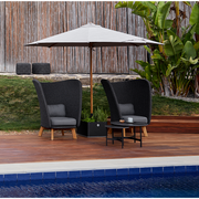 cane line classic parasol w/pulley system lifestyle with chairs