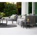 cane-line moments 3 seater sofa Grey, String Open Cane-line Soft Rope Incl. Grey Cane-line AirTouch in a patio with moments lounge chair and outdoor furniture lifestyle