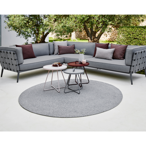 cane-line dot rug 55 multi colour soft rope in a patio with outdoor furniture lifestyle