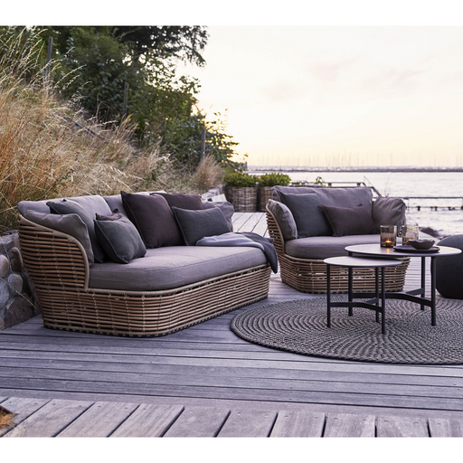 cane-line discover rug 78 taupe soft rope in a patio with outdoor furniture lifestyle