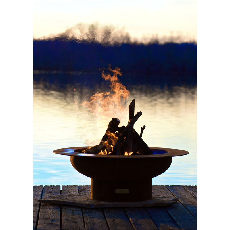 Fire pit art outdoor Saturn fire pit stainless steel with wood in a lake lifestyle