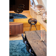 Le Feu Mocca Dome Bioethanol Fireplace ground high black bowl, smoked legs and steel burner indoor with dining table and chairs lifestyle