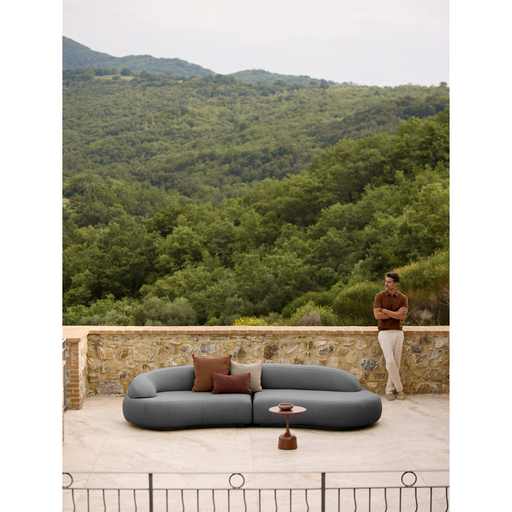 cane-line mellow 4-seater sofa grey, cane-line airtouch sofa in a patio with outdoor furniture lifestyle