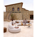 cane-line mellow 6 seater sofa Sand, Cane-line AirTouch sofa in a patio with outdoor furniture and two people enjoying the sofa lifestyle