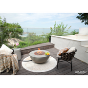 Modeno Roca Fire Table in a patio with tank cover and outdoor furniture lifestyle