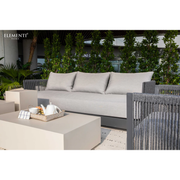 Elementi Capri Dark Grey Powder-Coated Frame w/ Granite Cushions Round Rope Weaving  3 Seater Sofa and coffee table in a garden setting.