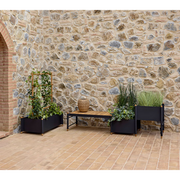 cane-line Sticks bench w/planter Teak Lava grey aluminium in a patio lifestyle