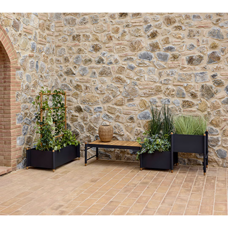 cane-line Sticks bench w/planter Teak Lava grey aluminium in a patio lifestyle