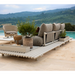 sticks platform corner sofa large Teak Desert sand Cane-line Rise cushion in a patio with outdoor furniture lifestyle