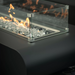 Close up of The Outdoor Plus fire pit on with windscreen 