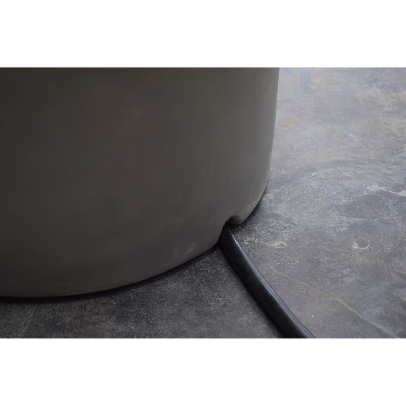 elementi tank cover oval smooth finish in a patio lifestyle