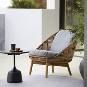 cane line hive lounge chair Natural, large round tube Cane-line Weave w/teak with Desert sand, Cane-line Rise cushion in a patio lifestyle