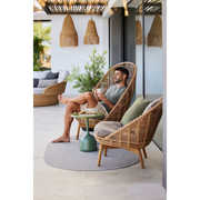 cane line hive lounge chair Natural, large round tube Cane-line Weave w/teak with Taupe, Cane-line AirTouch cushion in a patio with hive highback chair lifestyle