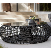 Cane line Nest coffee table footstool large Aluminium Weave black in a patio lifestyle
