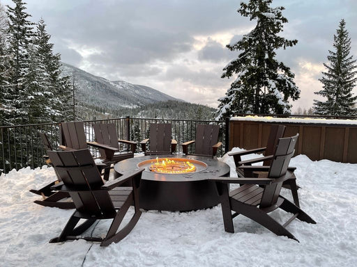 60 powder coated fire pit black outdoor in winter with outdoor chairs lifestyle