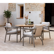cane line Sticks armchair Taupe aluminium sand cushion lifestyle with round dining table